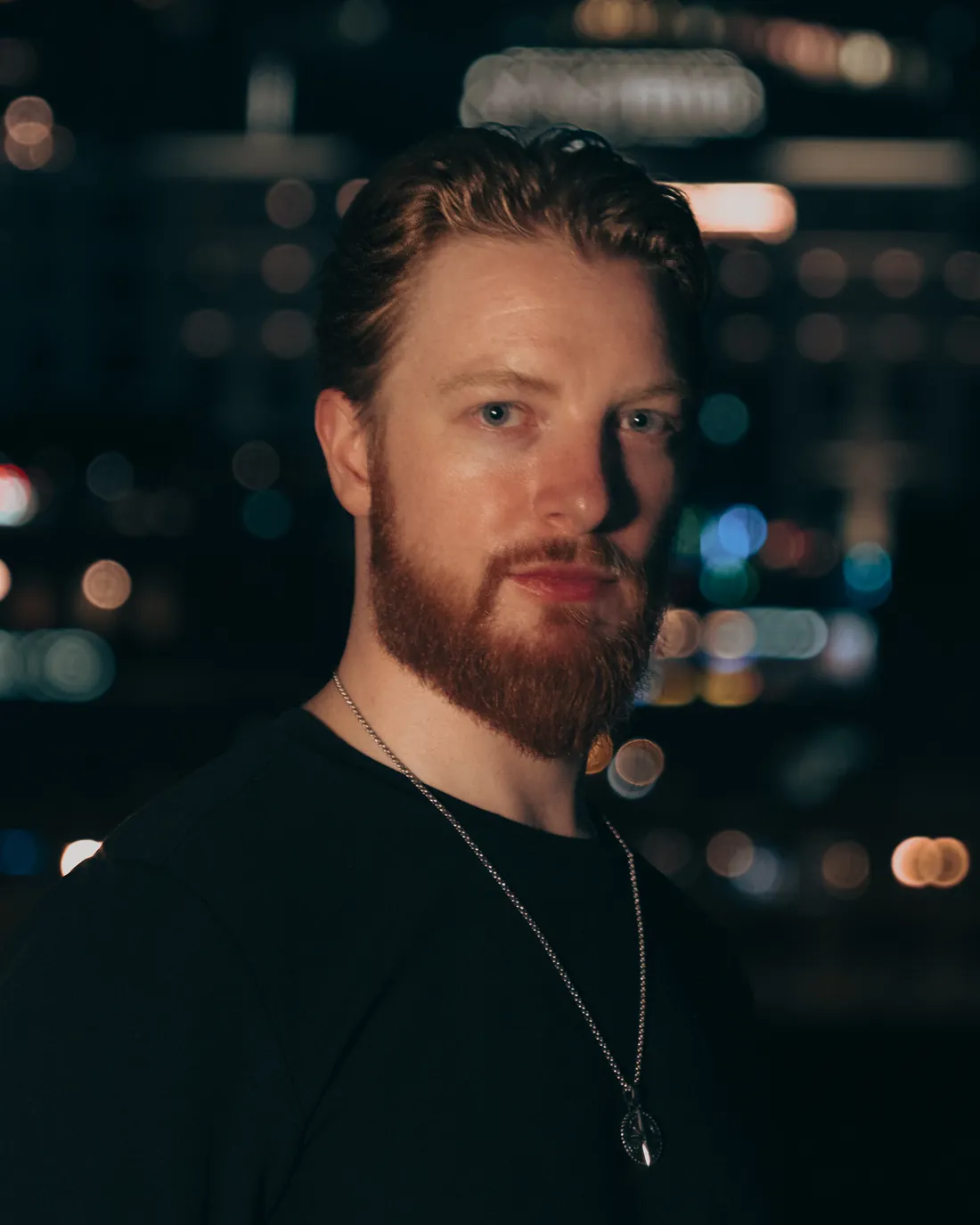 Kyle Redstone, Creative Director of Citadel Creative Studios, photographed at night in Nashville