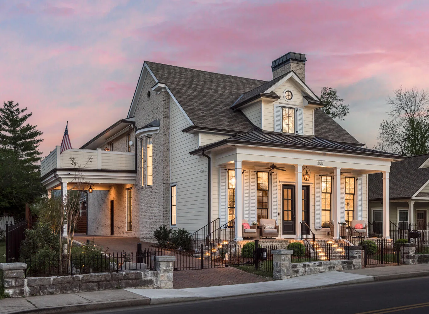 Twilight exterior of 305 Natchez Street, a Louisiana inspired estate in downtown Franklin, Tennessee